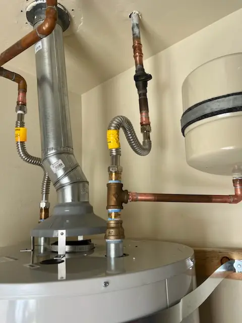 Water heater installation and plumbing repair in Quaker Gardens